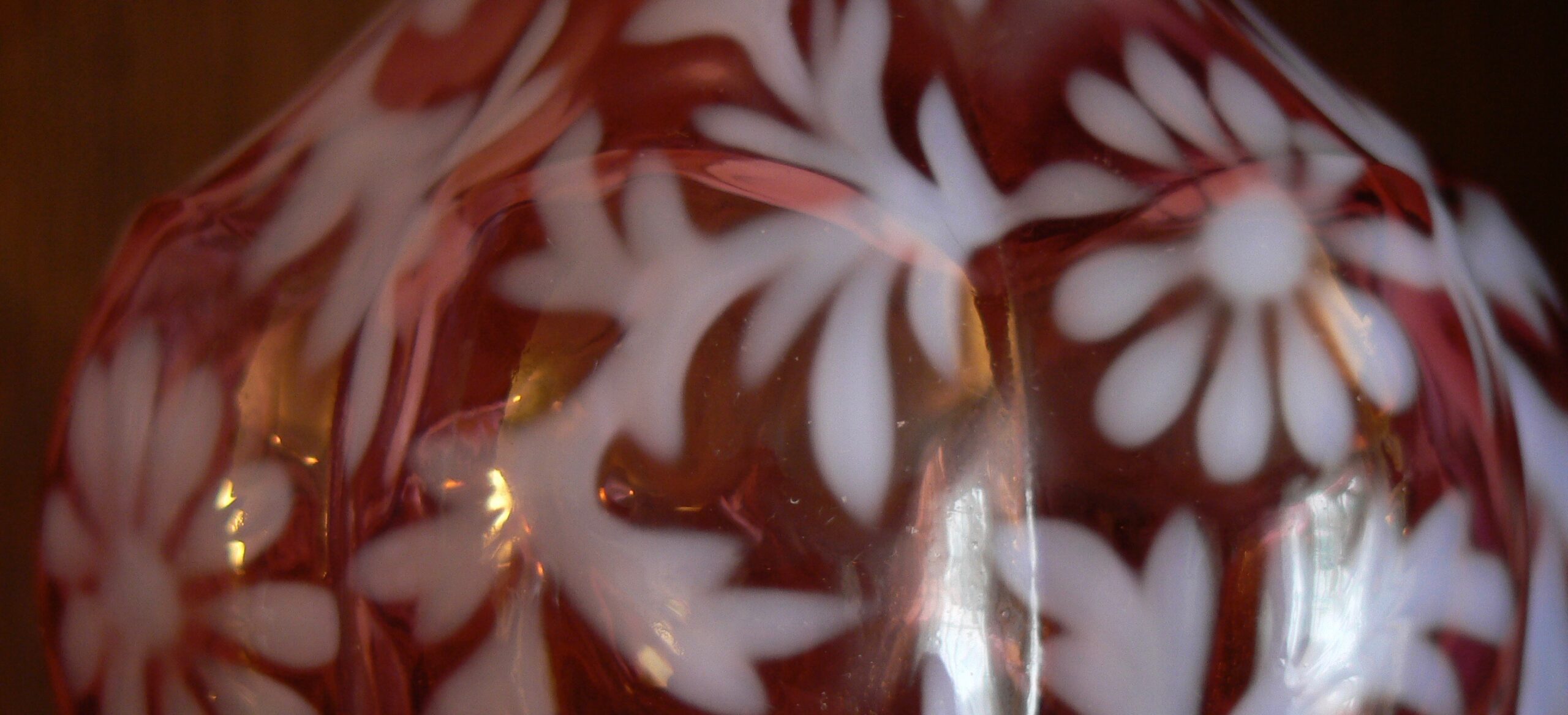 photo of antique art glass bottle details ready for antique and estates appraisal services by appraiser Jerry L. Dobesh, ASA